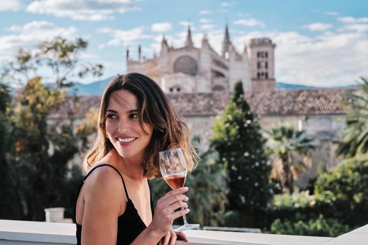 El Llorenc Parc De La Mar - Adults Only Palma de Mallorca Exterior photo A woman drinking Sherry